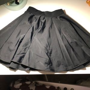 Custom made black circle skirt w/ kick pants.
